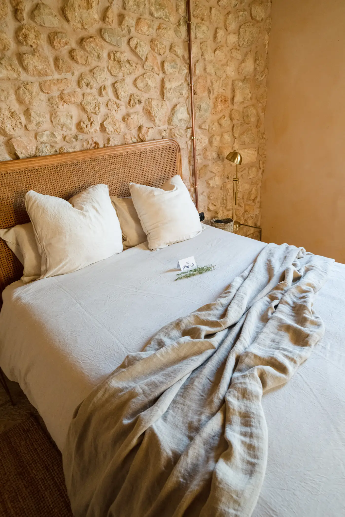 Casa Mana — pool terrace and garden in warm afternoon light, the Tramuntana mountains in the distance