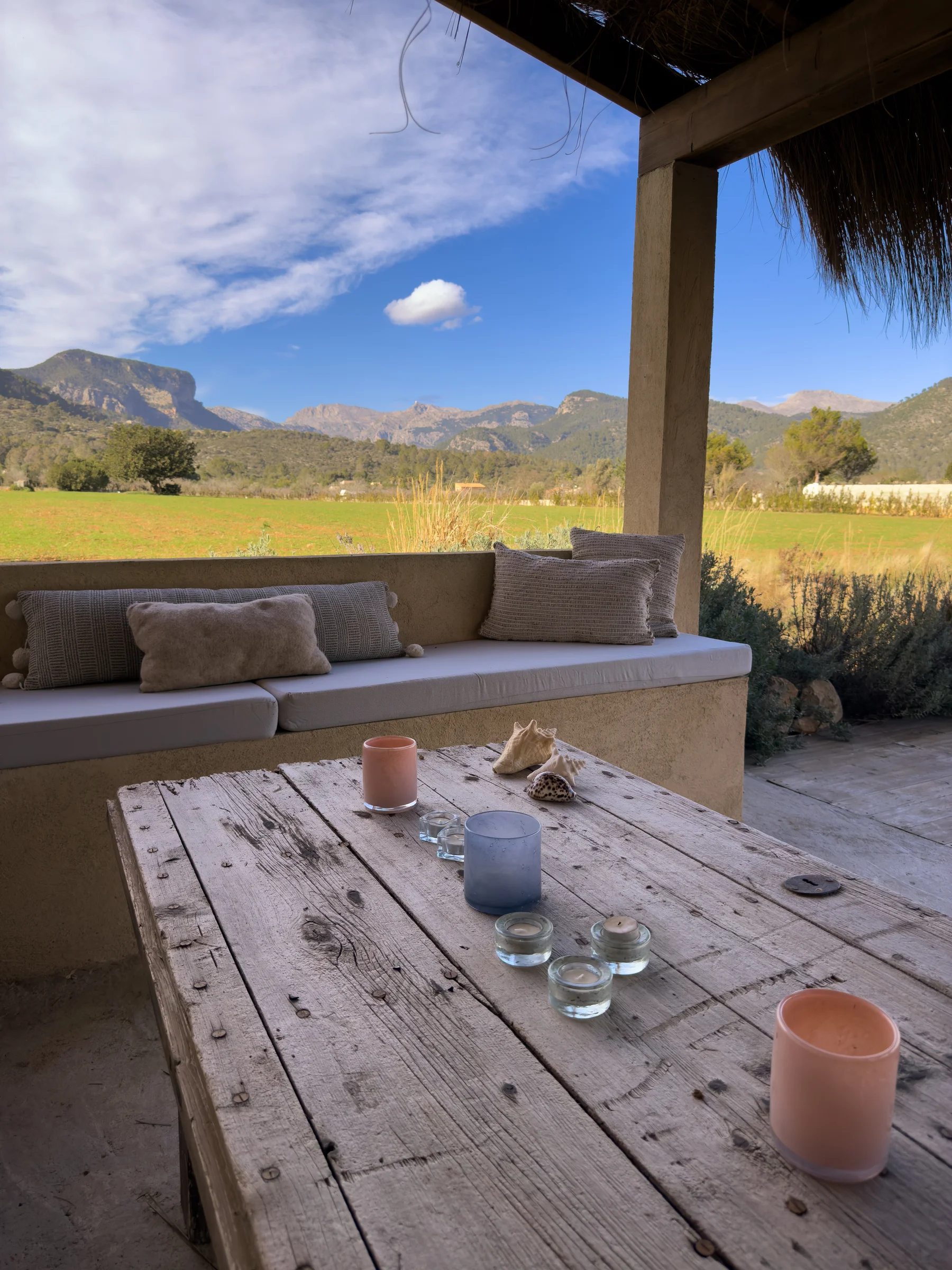 The covered terrace — open to countryside and mountain views