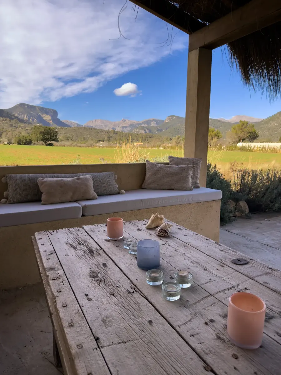 The covered terrace — open to countryside and mountain views